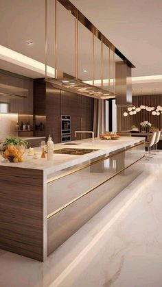 a modern kitchen with marble counter tops and stainless steel appliances, along with an island in the middle