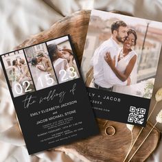 two wedding cards on top of a wooden slice