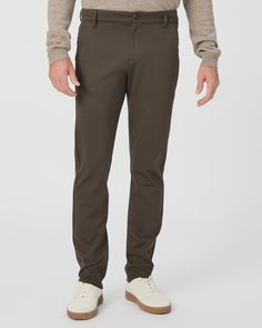 Stafford is our modern trouser, fitted through the thigh and tapered from the knee to the leg opening. Finished with a rubberized button and back welt pockets, this pair comes in a dark pine green shade and is made from our TRANSCEND KNIT performance hybrid fabric. TRANSCEND KNIT contains three super stretch fibers knitted together for maximum comfort and a refined look. Expertly crafted to keep up with the guy on-the-go, this versatile fabric takes men's fashion to the next level without sacrif Pine Green, Keep Up, Welt Pocket, Shades Of Green, The Knee, Men's Fashion, Trousers