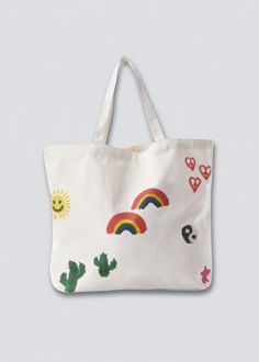 Elevate your everyday with our Art Doodles Tote Bag, showcasing a playful array of smiley faces, snakes, cherries, stars, heart peace signs, cacti, and rainbows – all in a unique Coney Island Picnic design. This screen-printed tote, with twin carry handles, offers the perfect size for your every need – from back-to-school essentials to convenient grocery trips. Make a statement while carrying it all. 100% Cotton Canvas Allover screen print front and back Return Policy Shipping Policy Playful Handmade Everyday Bags, Casual Hand Painted Bags For Everyday, Playful Everyday Shoulder Bag, Casual Hand Painted Bags For Daily Use, Artsy White Everyday Shoulder Bag, Playful White Canvas Bag For Everyday Use, Playful White Canvas Bag For Everyday, Casual Hand Painted Canvas Bag For Everyday Use, Fun Rectangular Canvas Bag