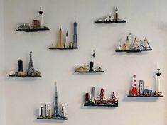 many legos are arranged on the wall to display them