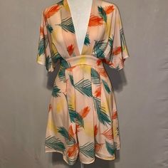 Shein “Plunging Tie Open Back Tropical Dress” Never Worn Before, Perfect Condition Open Back With Tie Behind The Neck Kimono Sleeves With Plunged Deep V-Neck Tropical Print Mini Hem Length 100% Polyester Machine Wash Or Professional Dry Clean Flowy Tropical V-neck Dress, Flowy V-neck Tropical Dress, Tropical V-neck Mini Dress For Brunch, Green V-neck Tropical Mini Dress, Tropical Printed V-neck Dress, Summer V-neck Lined Mini Dress, Tropical V-neck Printed Dress, Tropical V-neck Mini Dress For Vacation, Beachwear V-neck Lined Dress