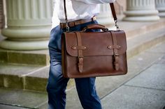 This handcrafted men's leather briefcase was inspired by vintage lawyer briefcases from decades ago. Made of full grain leather that's rich in character and solid antique brass hardware, this bag is built to last. Brown Briefcase With Palladium Hardware For Work, Brown Palladium Hardware Briefcase For Work, Luxury Satchel Briefcase With Brass Hardware, Timeless Brown Briefcase With Palladium Hardware, Classic Cognac Briefcase For Formal Use, Classic Cognac Satchel For Business Trips, Luxury Business Satchel With Brass Hardware, Luxury Satchel With Brass Hardware For Business, Office Satchel With Brass Hardware