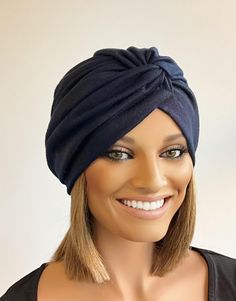 This beautiful turban hat is fully lined in soft bamboo which is not only moisture wicking but will control the heat of the scalp by cooling when too warm and holding the heat in slightly cooler weather. Soft blunt Bob short hair is attached into the lining making this a simple pull on style. Please note that all of our Etsy listings includes Etsy fees, if you would prefer to purchase without these fees you can shop all of our products directly from our website https://www.headscarvesbyciara.co. Hair Halo, Short Bob Hair, Hat Hair, Halo Hair, Turban Hat, Bob Hair, Cooler Weather, Soft Shorts, Short Bob Hairstyles