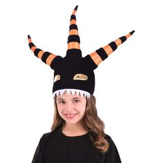 This monstrous hat is the perfect way to celebrate Halloween, even if you're in our boring ol' human world. The hat has Tim Burton's flair with striped tentacles popping up in the air and mysterious golden eyes on the base. Sharp teeth line the bottom to make it seem like you're getting devoured by a ghoul. Product Specifications 100% polyester fabric and fiberfill, 100% polyurethane foam Hat has velvet outer shell, broadcloth lining, velvet and satin striped tentacles Hat has hook and loop fastener size-adjustment band in lining Stuffed tentacles on top of hat are each 10" long Appliqued eyes and teeth Demon Plush, Jack Skellington Mask, Nightmare Before Christmas Costume, Demon Costume, Spooky World, Elf Pets, Thanksgiving Tree, Plush Hat, Beady Eye