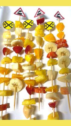 fruit skewers with warning signs on them