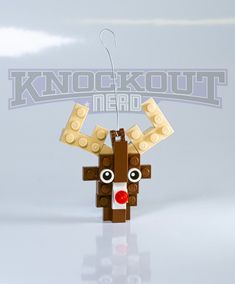 a lego reindeer ornament hanging from a string