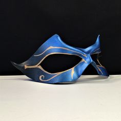 "Blue leather mask fades to black. Handpainted gold Egyptian-style design. ORDER ANY COLOR Great for any masquerade party, Renaissance Faire, Masked wedding, or Mardi Gras celebration! CosPlay Conventions, Comicon super hero costume, Halloween costume, Carnival, Masquerade ball, Renaissance Faire! WATERPROOFED, Supple leather is formed to facial contours. ADJUSTABLE: Secured with comfortable ties or adhesive. Available without holes. Scroll further down for details! MATCH YOUR COSTUME ♦ Professi Themed Masquerade Mask For Costume Party And Cosplay, Fantasy Masks For Masquerade And Cosplay Events, Fantasy Style Masks For Masquerade And Cosplay, Masquerade Eye Mask For Cosplay Events, Gold Masquerade Mask For Carnival Cosplay, Cosplay Events Masquerade Eye Mask, Cosplay Events Eye Mask For Masquerade Costume, Themed Masks And Prosthetics For Cosplay Events, Themed Masks And Prosthetics For Party And Cosplay Events