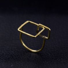 "Double Square Ring, Statement Ring, Modern Ring, Geometric Ring, Simple Ring, Open Square Ring, Minimalist Jewelry, Square Ring Size:- All Size Available In Variation Metal:- Brass IMPORTANT NOTE....👇 1 product free gift on purchase of 4 products. You can choose the free gift as your wish. Take a screenshot of the free gift you like from my shop and send me a photo in personal message. MUST READ....👇 5 stars is my shop's priority. So contact me before leaving any negative review. I am here on Modern Brass Stackable Rings For Gift, Modern Brass Stackable Rings As Gift, Modern Brass Midi Rings, Modern Brass Open Stackable Rings, Minimalist Brass Midi Rings With Open Design, Modernist Geometric Rings For Gift, Modernist Geometric Rings For Gifts, Minimalist Brass Midi Rings For Everyday Wear, Minimalist Brass Midi Rings For Everyday