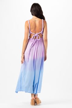 Introducing our enchanting Starlight Maxi Dress, featuring an open tie-back closure, designed to captivate attention and exude effortless charm. This stunning piece seamlessly blends elegance with a hint of allure, making it the perfect choice for any occasion. Details: 100% Rayon Hand wash cold & lay flat to dry Features: Unlined, Smocked scoop neck bodice, Thick rope straps with adjustable self tie feature, Open back detail, Ankle length maxi skirt, Dual side slits Beach V-neck Dress With Lace-up Back, Vacation Maxi Dress With Lace-up Back, Vacation Backless Dress With Lace-up Back, Purple Maxi Dress With Spaghetti Straps For Beach, Summer Backless Lace-up Maxi Dress, Blue Tie Back Midi Dress For Beach, Blue Tie-back Midi Dress For Beach, Blue Summer Dress With Knotted Straps, Strappy Back Maxi Dress With Back Opening For Spring