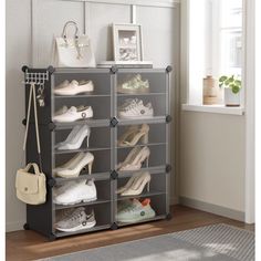 the shoe rack is organized with shoes and purses