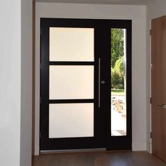 an open door with frosted glass on it