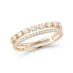 a yellow gold ring with three rows of diamonds on the side and an open band