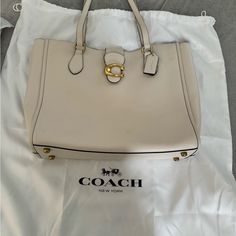 Coach Shoulder Bag, Excellent For Work It Can Fit Your Laptop And All Your Needs. I Used It A Few Times Excellent Condition. Please Check All Pictures. Everyday Tote Satchel With Branded Hardware, Cream Satchel With Branded Hardware For Everyday Use, Classic Shoulder Bag With Branded Hardware For Errands, Tote Satchel With Branded Hardware For Errands, Branded Hardware Everyday Tote Bag, Satchel Tote With Branded Hardware For Errands, Elegant Satchel With Branded Hardware For On-the-go, Everyday Tote Bag With Branded Hardware, Shoulder Tote Bag With Branded Hardware For Errands