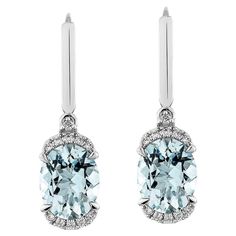 Elevate your look with our stunning Santa Maria aquamarine set, featuring a mesmerizing ice blue hue that radiates elegance. Enhanced with diamonds and crafted in white gold, these drop earrings offer a timeless allure with a touch of modern refinement. Aquamarine Drop Earrings in 18Karat White Gold with White Diamond. Aquamarine: 4.19 carat, 10X8mm size, oval shape. White Diamond: 0.17 carat, 1.30mm size, round shape, G color, VS clarity. White Diamond: 0.03 carat, 1.50mm size, round shape, G color, VS clarity. Gold: 4.89g, 18Karat White Gold. Butterfly Pin and Push Back E677 Butterfly Pin, Indian Heritage, Icy Blue, Modern Earrings, Stone Cuts, Elevate Your Look, Santa Maria, Blue Hues, Diamond Stone