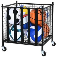 a metal basket filled with lots of different types of soccers and basketballs on top of each other