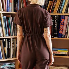 Noble Carriage's signature Utility Suit is finally available for adults to make all of your twinning jumpsuit dreams come true. Made in Peru with their durable yet buttery soft GOTS certified organic Pima cotton canvas in a brown Chocolate shade and featuring a cropped leg and cinched waist. Made in Peru Brown Loungewear Jumpsuits With Pockets, Brown Cotton Relaxed Fit Jumpsuits And Rompers, Casual Brown Cotton Jumpsuits And Rompers, Brown Cotton Jumpsuits And Rompers For Loungewear, Vintage Cotton Relaxed Fit Jumpsuits And Rompers, Vintage Cotton Jumpsuit With Relaxed Fit, Brown Relaxed Fit Jumpsuits And Rompers With Pockets, Vintage Cotton Jumpsuits And Rompers In Relaxed Fit, Vintage Cotton Jumpsuits And Rompers With Relaxed Fit