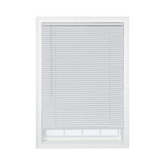 a white window blind with the blinds closed