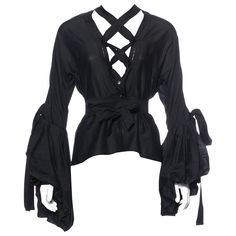 Tom Ford for Yves Saint Laurent Iconic Lace Up Top Blouse F/W 2002 Collection French size 40 Light Weight Black Cotton/Silk Blouse Oversize Balloon Sleeve with Bow and Open Side Extra Long Tie Closure at Front Made in Italy Excellent Condition ( button on one sleeve missing). Lace Up Top, Balloon Sleeve Blouse, Fancy Blouses, Peasant Top, Fashion Fits, Fancy Outfits, Peasant Tops, Look Cool, Tom Ford