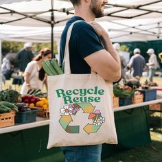 Carry your groceries and essentials in style with this eco-friendly tote bag. Featuring "Recycle Reuse" design, this reusable shopping bag encourages sustainability. Perfect for daily use and a great gift for environmentally conscious friends. This zero waste tote bag is a practical and fashionable addition to your collection. Show your commitment to the environment with this sustainable fashion accessory. Product Features: Printed on Both Sides Fabric: 100% Cotton Canvas | Heavy fabric (12 oz/y Cheap Reusable Canvas Grocery Bag, Customizable Eco-friendly Canvas Bag, Cheap Reusable Bags For Grocery Shopping, Cheap Reusable Bags For Vacation, Affordable Eco-friendly Canvas Bag With Graphic Print, Cheap Eco-friendly Canvas Bag For Gift, Cheap Trendy Recyclable Bag, Cheap Recyclable Bags For Everyday Use, Cheap Market Tote Bag