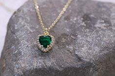 emerald green heart pendant necklace also available in magenta pink ,or rhinestone. Dainty minimalistic emerald green heart pendant charm necklace May birthstone necklace High quality 18k gold plated  With adjustable chain - Length option of 14'' to 16'' ,or 16'' to 18''  chain. Dainty minimalistic pendant charm. Great as a gift ,or for yourself for that special occasion! Any questions feel free to ask! Thanks for supporting a small family run business! Comes packaged in a beautiful box ready to Minimalistic Pendant, Green Heart Necklace, Necklace Love, Heart Choker, Green Heart, Heart Pendant Gold, Necklace Green, Gold Heart Necklace, Magenta Pink