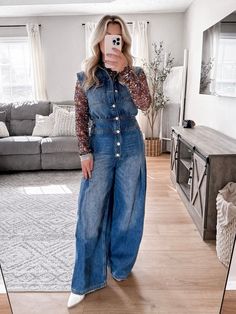 Model is 5'1", 34D, 6/28 and is wearing a size small. Item runs true to size - if you want a snug fit size down. Our McCallum Denim Jumpsuit features a medium wash true denim material, collared neckline, functional buttons down bodice, functional pockets on chest, pleated pant, wide leg pant. inseam: approx 28 1/2" More details: 100% cotton. hand wash or wash on cold and hang to dry. Medium Wash Denim Button-up Jumpsuit, Light Wash Overalls For Fall, Fall Light Wash Overalls, Fall Button-up Medium Wash Denim Jumpsuit, Light Wash Fitted Button-up Denim Jumpsuit, Fitted Light Wash Denim Button-up Jumpsuit, Light Wash Fitted Denim Jumpsuit Button-up, Fitted Dark Wash Button-up Jeans, Fall Button-up Medium Wash Jeans