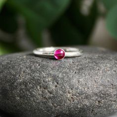 Sterling Silver Hot Pink Ruby Stacking Ring – AccentYourself Stackable Ruby Birthstone Rings With Round Band, Stackable Ruby Birthstone Rings, Ruby Stackable Birthstone Rings, Ruby Birthstone Stackable Rings, Ruby Stackable Round Band Promise Rings, Minimalist Ruby Birthstone Ring For Anniversary, Dainty Ruby Birthstone Ring For Anniversary, Dainty Ruby Anniversary Ring, Tiny Round Birthstone Ring For Anniversary