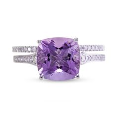 Let your affection shine vibrantly in this eye-catching white gold cushion-cut purple amethyst and diamond bridal set. Created in 14K white gold The engagement ring glistens with a 9.0mm cushion-cut bright purple amethyst. Diamonds line the tapered shank for added shimmer. The coordinating diamond wedding band completes this 1/6 ct. t.w. diamond bridal set. Purple Sapphire Zales, Amethyst And Diamond Engagement Ring, Purple Amethyst Wedding Ring, Purple Wedding Rings, Purple Diamond Ring, Purple Engagement Rings, Center Stone Engagement Ring, Amethyst Wedding Rings, Square Engagement Rings