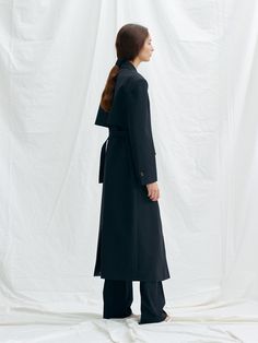 Editor's NotesThis is an oversized tailored coat from H8. It is made of a combined material and creates a structural shape with a solid texture. Recommend to wear with Mile Pants and setup.- Powerful post-processing on lightweight, small wool material- Built-in shoulder pads and hidden pockets.- Waist size can be adjusted with the belt on the back plate- H8 logo engraved cow horn button- Silk stitch detail*The color of the image may differ from the actual color depending on the resolution of you Modern Outerwear With Structured Boning, Modern Structured Outerwear With Boning, Structured Modern Outerwear For Work, Modern Black Wool Coat For Work, Sleek Oversized Outerwear For Work, Sleek Structured Outerwear For Work, Sleek Structured Outerwear For Office, Modern Structured Outerwear, Black Structured Outerwear For Office