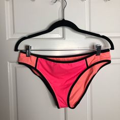 Never Worn Sporty Pink Swimwear For Poolside, Sporty Pink Swimwear For Vacation, Pink Fitted Color Block Bottoms, Fitted Pink Color Block Bottoms, Pink Stretch Swimwear, Pink Stretch Summer Swimwear, Stretch Pink Summer Swimwear, Pink Stretch Swimwear For Swimming, Pink Sporty Swimwear For Beach Season