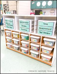 classroom storage bins with labels on them