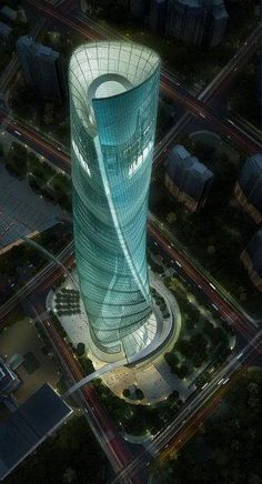 an aerial view of a tall building at night