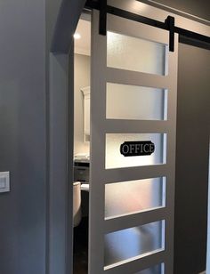 an open door with the word office on it