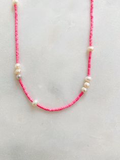 Pink Summer Jewelry For Everyday, Handmade Pink Necklaces For Everyday Wear, Adjustable Pink Pearl Necklace With Charm, Adjustable Pink Pearl Chain Necklace, Handmade Pink Necklace For Everyday Wear, Handmade Pink Necklace For Everyday, Handmade Pink Everyday Necklaces, Pink Pearl Jewelry With Tiny Beads, Pink Everyday Single Strand Necklace