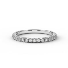 a white gold wedding band with round diamonds