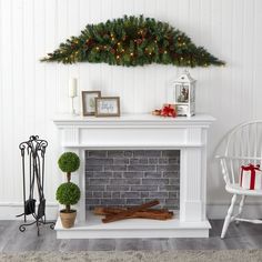 a living room with a fireplace decorated for christmas