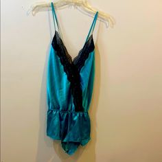 Victoria’s Secret Silk Lingerie Romper Color: Turquoise Size: Medium Condition: Brand New Blue V-neck Camisole For Loungewear, Victoria's Secret Blue V-neck Sleepwear, Blue V-neck Party Sleepwear, Victoria's Secret Blue Sleeveless Sleepwear, Blue Sleeveless Victoria's Secret Sleepwear, Sleeveless Blue Victoria's Secret Sleepwear, Victoria's Secret Blue Sleepwear With Lace Trim, Victoria's Secret Blue Sleepwear For Night, Silk Lingerie