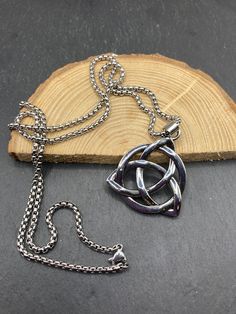 "Triqueta Celtic knot Viking pendant.  Can be purchased with a chain or with an adjustable cord made from waxed cotton cord or leather thonging weight with chain approx 20g, 10g without Triqueta, Triquetta, Triquetra or Trinity knot: This popular variety of the Celtic knot has different names. The name simply means \"triangular\". A triqueta knot consists of three circular arcs that are intertwined. Often a circle is also incorporated into the symbol. Like other Celtic knots, the triangle knot stands as an endlessly intertwined figure as a symbol of eternity. All items are packaged using recyclable materials where possible to ensure they are protected in transit.  Multiple items will be packed together unless you require separate packaging, for instance, if you are gifting the items.  Plea Silver Necklaces With Adjustable Length And Waxed Cord, Silver Necklace With Adjustable Length And Waxed Cord, Silver Necklace With Waxed Cord For Gift, Silver Waxed Cord Necklace For Gift, Viking Pendant, Celtic Knots, Trinity Knot, Recyclable Materials, Hippie Necklace