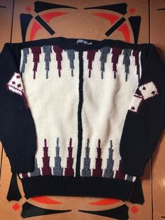 wool hand knit backgammon sweater - brand new retro robert stock sweater retro sized medium this sweater appears to be retro brand new because all of them hems are still tight. the sweater weighs almost 2 lbs. the measurements are: from armpit to armpit is from the top of the shoulder to the waist is from the top of the shoulder to the wrist is this is s truly unique sweater lastly please note the photograph of the dropped stitch that was made when the sweater was made. defects can often happen with hand knit items. there is no threat of the sweater unravelling. Knit Items, Unique Sweater, Unique Sweaters, Retro Brand, New Retro, Beautiful Sweater, Sweater Brands, Cool Sweaters, Baby Sweaters