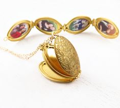 "Family Tree Locket Necklace, Gold Locket, Family Necklace, Family Photo Locket, Four Photo Locket, Unique Locket Necklace, Wedding Photos Gold oval folding four photo locket with engraved flowers on the front, that opens to hold your 4 favorite photos! PHOTOS ARE INCLUDED! What a better way to hold your loved one's close than with a locket that displays four photos! 14k gold filled chain. Locket measures 1 1/4\" in length. THIS LOCKET INCLUDES 4 OF YOUR FAVORITE PHOTOS! PHOTO SPECIFICATIONS: *e Unique Locket Necklace, Bouquet Locket, Unique Locket, Locket Gold, Gold Locket Necklace, Photo Gold, Family Tree Necklace, Photo Locket Necklace, Unique Jewelry Gifts