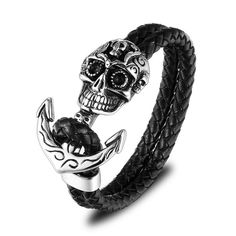 Skull Anchor Leather Bracelet Skull Anchor Leather Bracelet is an all-leather bracelet handcrafted with a classic skull theme. Our men's leather bracelets are a biker's best friend, and they are ideal for hardcore bikers, Harley Davidson enthusiasts, and people who like rocking the leather look. Our leather bracelets are handcrafted with solid leather, without any stitching to make them look clean, tough, and classic. They make great gifts for any biker and are available in sizes 21 and 5cm. Thi Adjustable Gothic Bracelets With Skull Print, Gothic Skull Print Bracelets As Gift, Silver Skull Leather Bracelet In Punk Style, Silver Skull Punk Leather Bracelet, Punk Silver Leather Skull Bracelet, Adjustable Gothic Leather Bracelet Gift, Halloween Skull Print Bracelet Gift, Adjustable Skull Print Bracelet As Gift, Adjustable Skull Leather Bracelet Gift