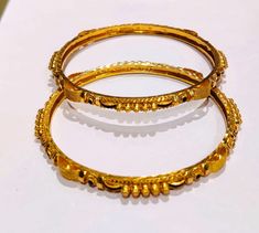 22K Real Solid GOLD Bangle - Indian Style Bangles - Real Solid Gold handcrafted bangle- Gift for wife An elegant and sophisticated personalized bangles with alot of tiny details. Modern touch with Indian heritage look. This item has been handmade and it took me around 30 days to get the final product. PRODUCT SPECIFICATION: Material: Real Solid 22K Gold ( HALLMARKED) Design: Indian Karigiri Weight: 4 pcs is 48 grams approx Width: 8mm Theme: Indian Gokhru design Size: We will make your size ( Mes Festive Yellow Gold Tilla Bangle, Elegant Gold Bangle For Navratri, Traditional Gold Bracelet For Ceremonial Occasions, Traditional Gold Bangle Bracelet Hand Set, Yellow Gold Chandbali Bangle With Intricate Design, Traditional Hand Set Gold Bangle Bracelet, Gold Bangle For Wedding And Navratri, 22k Gold Temple Jewelry Bangle, Heavy Yellow Gold Bangle For Diwali