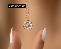 🎂 Perfect Birthday & Christmas Gifts 🎂   Seeking that **birthday gift for her** or a unique **personalized gift for mom**? Dive into the world of daisies, a symbol of pure beginnings and innocence. Our Minimalist Daisy Necklace intertwines the simplicity of a daisy with the luxury of handcrafted jewelry. A piece that will remind her of sunlit days and nature's joy, it's the embodiment of sentiments she'll treasure. 🚀✈️ Swift & Secure Shipping 🚀✈️   Experience prompt shipping with no delays, Dainty White Jewelry For Gift, Dainty White Jewelry For Gifts, White Dainty Jewelry For Gifts, Small Jewelry For Mother's Day Gift, Small Mother's Day Jewelry Gift, Tiny Flower Jewelry For Gifts, Tiny White Jewelry For Gift, Dainty White Jewelry For Birthday Gift, Tiny Flower-shaped Jewelry Gift