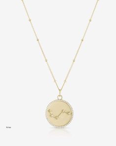 A new take on our iconic Zodiac Medallion Necklace, the Constellation Collection offers a subtly sophisticated way to wear your own star sign or that of a loved one. Please note, due to the unique nature of this necklace, each individual medallion may have slight variations from the images pictured. 14k Gold Zodiac Sign Necklace With Round Pendant, Yellow Gold Zodiac Sign Medallion Necklace, 14k Gold Zodiac Medallion Necklace, 14k Gold Zodiac Sign Pendant Necklace, Celestial White Gold Round Pendant Necklace, Elegant Zodiac Sign Round Pendant Necklace, Zodiac Sign Pendant Necklace For Anniversary, Symbolic Diamond Medallion Necklace, Celestial Medallion Necklace For Anniversary