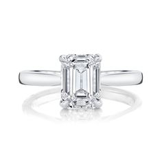 ✥ Experience the elegance of our 2.25ct Emerald Cut Moissanite Solitaire Diamond Engagement Ring. This stunning ring features a breathtaking 2.25ct emerald-cut moissanite, known for its striking clarity and sophisticated allure. The classic solitaire design showcases the gemstone's clean lines and radiant sparkle, making it a timeless choice for any bride-to-be. Crafted with meticulous attention to detail, the band complements the stone beautifully, ensuring a comfortable fit. Perfect for those who appreciate modern elegance, this engagement ring symbolizes enduring love and commitment, creating unforgettable memories that will last a lifetime. Celebrate your unique love story with this exquisite piece.✦ Main Stone Details✧ Shape: Emerald Cut Moissanite✧ Weight: 2.25CT (9x7mm)✧ Color: DEF( Emerald Cut Solitaire, Solitaire Diamond Engagement Ring, Emerald Cut Moissanite, Diamond Alternatives, Emerald Color, Basic Design, Diamond Settings, Ring Setting, Diamond Solitaire Engagement Ring