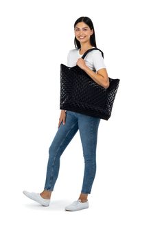 The Haute Shore Icon Night tote is a quilted puffer tote with large exterior slip pocket and interior zip and slip pockets. Ultra light weight. Large exterior slip pocket. Interior zip and slip pockets. Dimensions: 23" wide x 13.5" tall x 3.5" deep. Washable with mild soap. Hang dry. Casual Quilted Shoulder Bag With Double Handle, Casual Quilted Tote Shoulder Bag, Modern Quilted Shoulder Bag For Everyday, Modern Quilted Everyday Shoulder Bag, Casual Quilted Shoulder Bag For Shopping, Casual Black Quilted Bag, Trendy Quilted Shopping Bags, Black Quilted Shoulder Bag For Shopping, Modern Quilted Bag For Shopping