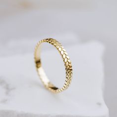 A leaf ring made of 14K solid gold. An elegant choice of his and her wedding bands that are based in nature. This laurel ring is an excellent option for stacking. 100% handcrafted with love! PRODUCT DETAILS ● Material: 14K solid gold - white gold - rose gold RING SIZING For General Reference: ● we use standard US Ring Sizing ● an average women's ring finger is size 6 ● if your ring size is not listed please contact us HOW TO ORDER - CUSTOM ORDERS ● Choose from the drop-down menus the available o Minimalist Gold Jewelry With Decorative Band, Gold Minimalist Jewelry For Marriage, Minimalist Gold Jewelry For Marriage, Delicate 14k Gold Jewelry For Marriage, Laurel Ring, Boho Wedding Bands, Nature Wedding Band, Boho Rings Gold, Leaf Wedding Band