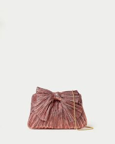 Shop the Rayne Platinum bow clutch at Loefflerrandall.com Elegant Bags With Bow For Party, Elegant Party Bag With Bow, Elegant Party Bags With Bow Detail, Gold Feminine Evening Bag For Formal Occasions, Feminine Gold Evening Bag For Party, Feminine Gold Evening Clutch, Gold Feminine Clutch For Formal Occasions, Chic Rose Gold Evening Bag For Events, Rose Gold Glamorous Clutch For Formal Occasions