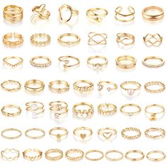 PRICES MAY VARY. VINTAGE RING KIT: You will get 47pcs knuckle rings with a combination of various styles such as CZ ring, twist ring, hollow ring, etc. Can be As Stacking Rings,Thumb Ring, Knuckle Rings. Multiple ways of stacking makes you unique every day. Great value for your money. PREMIUM-QUALITY: All rings are made of high-quality alloy materials combined with electroplating process, smooth surface, bright color, environmentally friendly materials, comfortable fit design, suitable for most Rings Set For Women, Hand Jewelry Rings, Y2k Rings, Inexpensive Jewelry, Vintage Gold Rings, Stackable Jewelry, Gold Ring Designs, Knuckle Rings, Gold Ring Sets