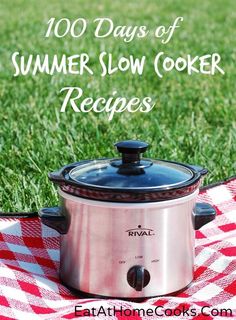 a crock pot sitting on top of a red and white checkered table cloth